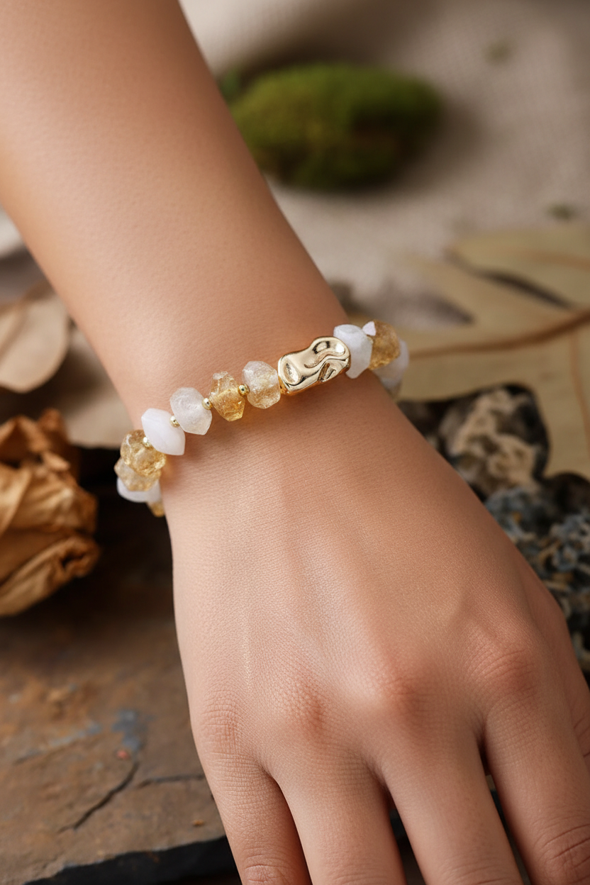 Model wearing citrine and white quartz bracelet