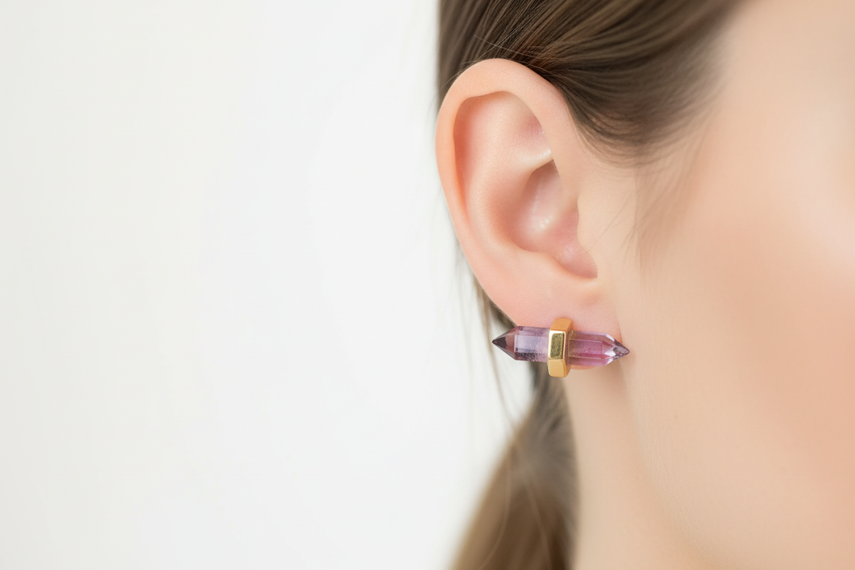 Model wearing horizontal amethyst crystal earrings